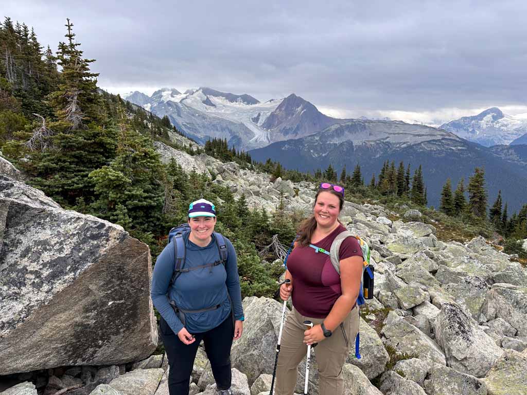 Two hikers pose for a photo on the Blackcomb trails in Whistler