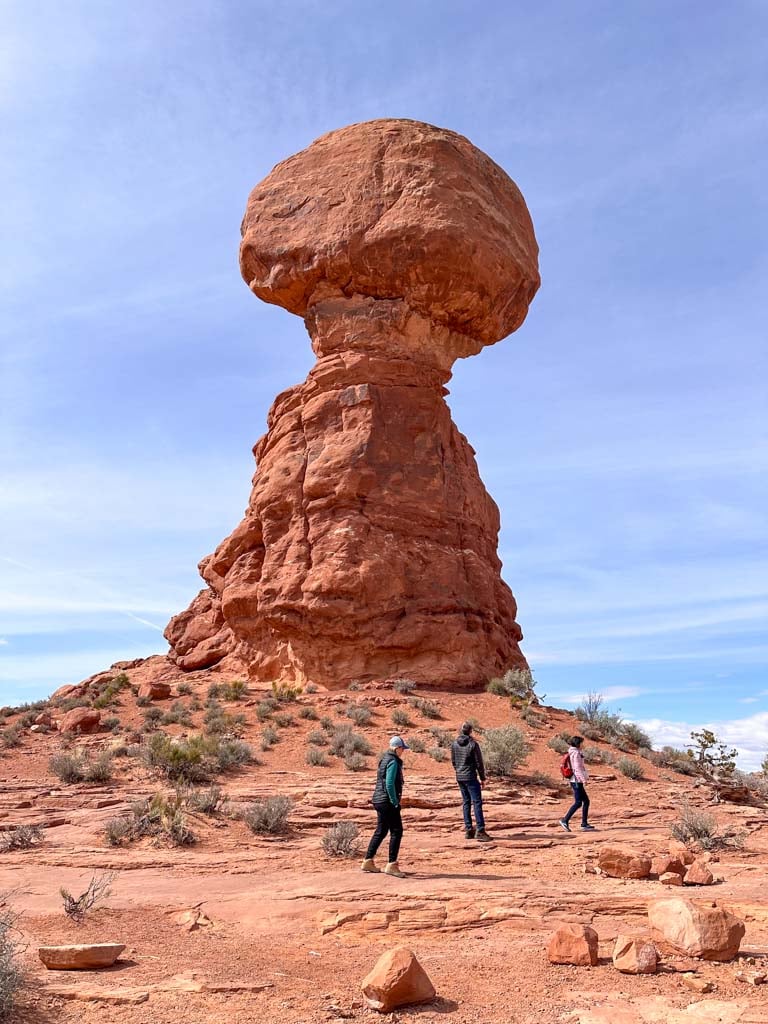 Balanced rock is one of the best short hikes in Arches National Park. A boulder balances on top of a very thin rock spire. 