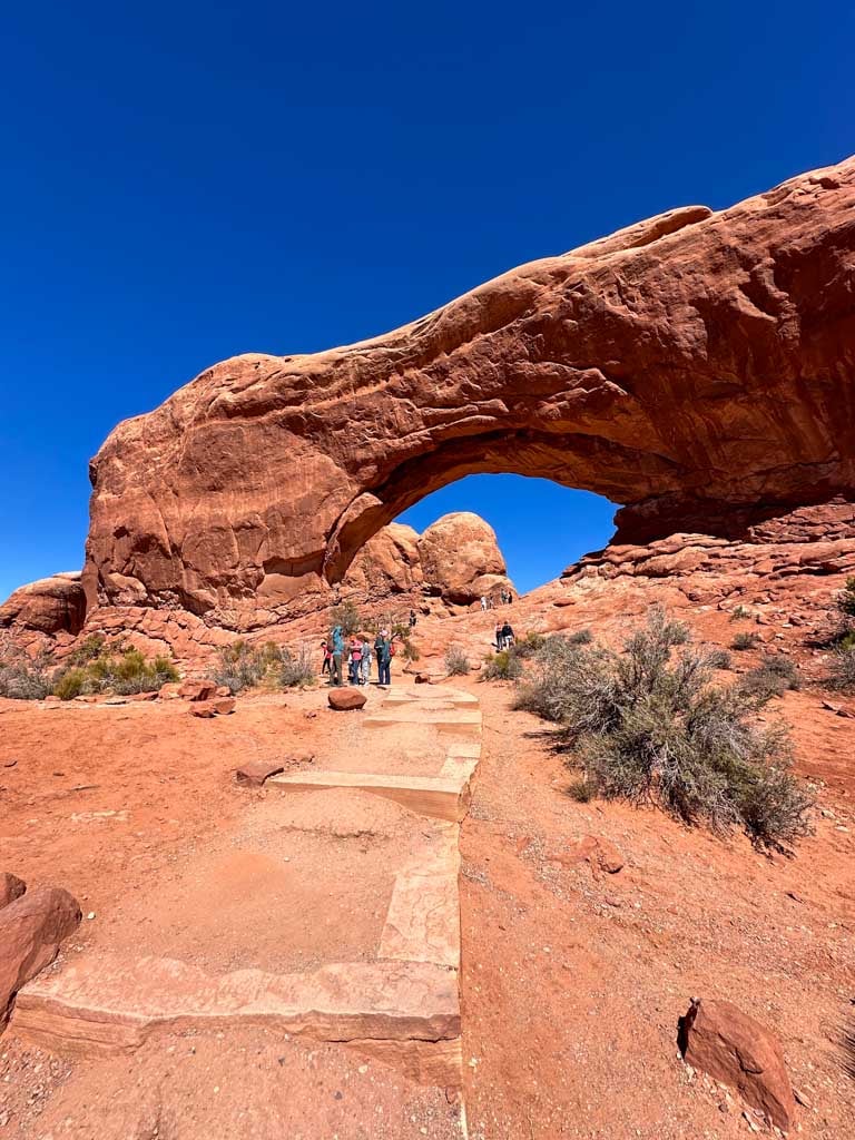 Stairs lead up to North Window Arch in Arches National Park