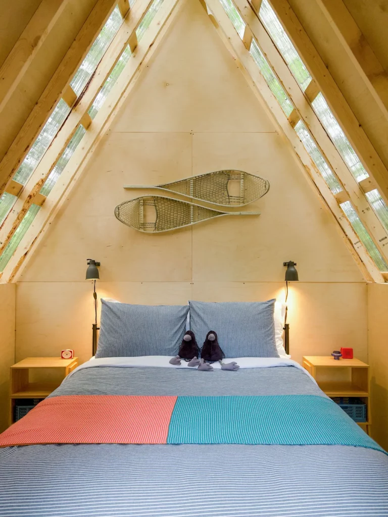 Interior of an a-frame cabin with skylights at The Stonewater on the Sunshine Coast.