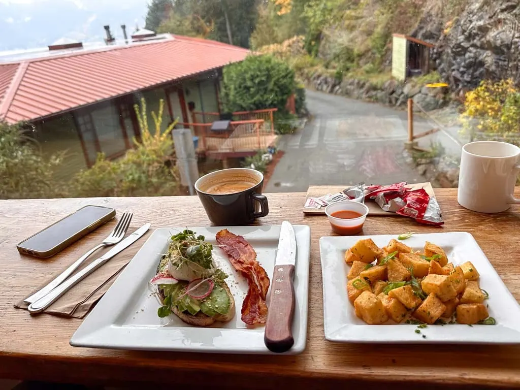 Breakfast at Artisan Eats Cafe at a table in front of the window. 