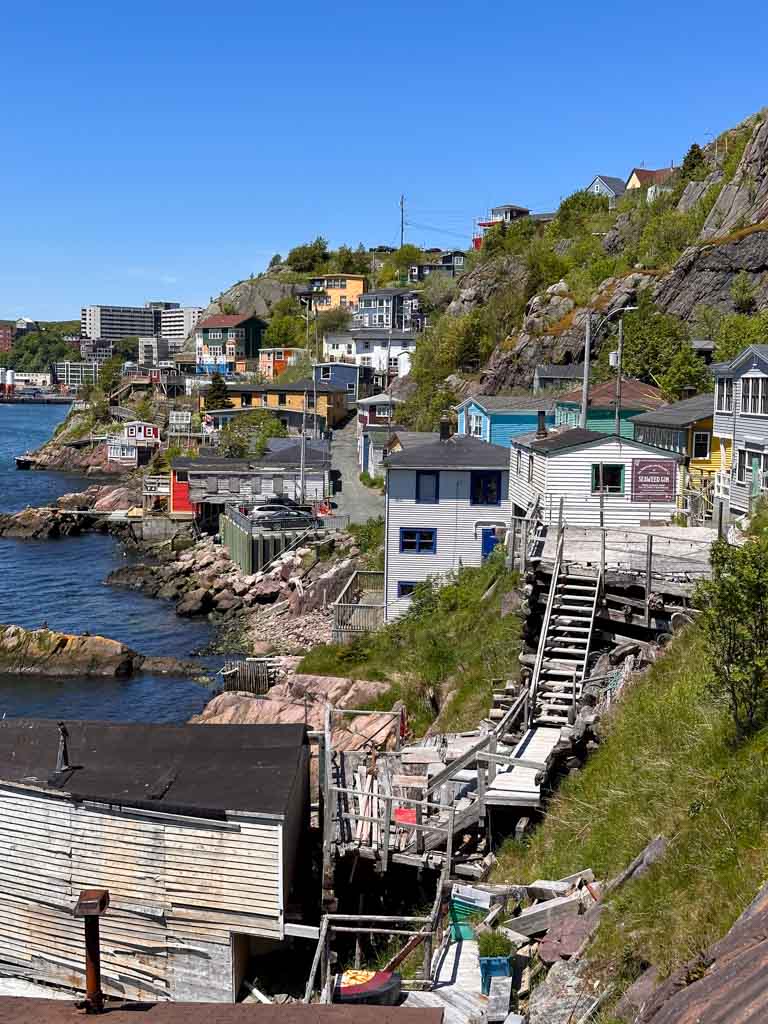 Colourful houses cling to the side of a cliff in the The Battery neighbourhood in St. John's