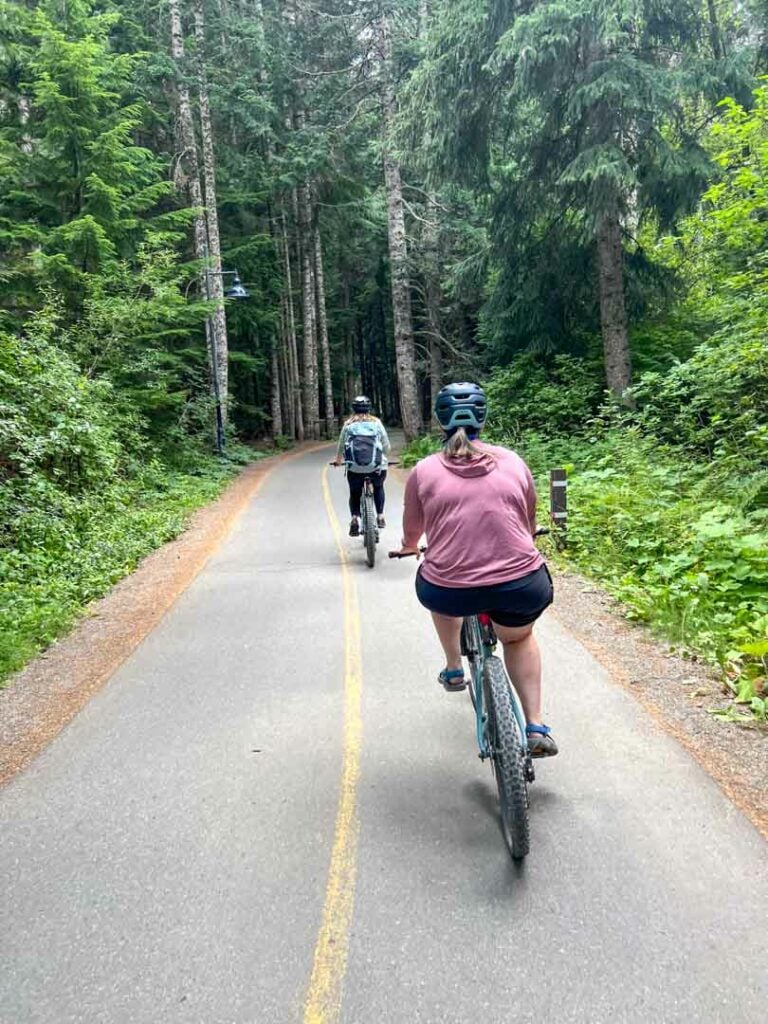 A woman biking on the Valley Trail in Whistler