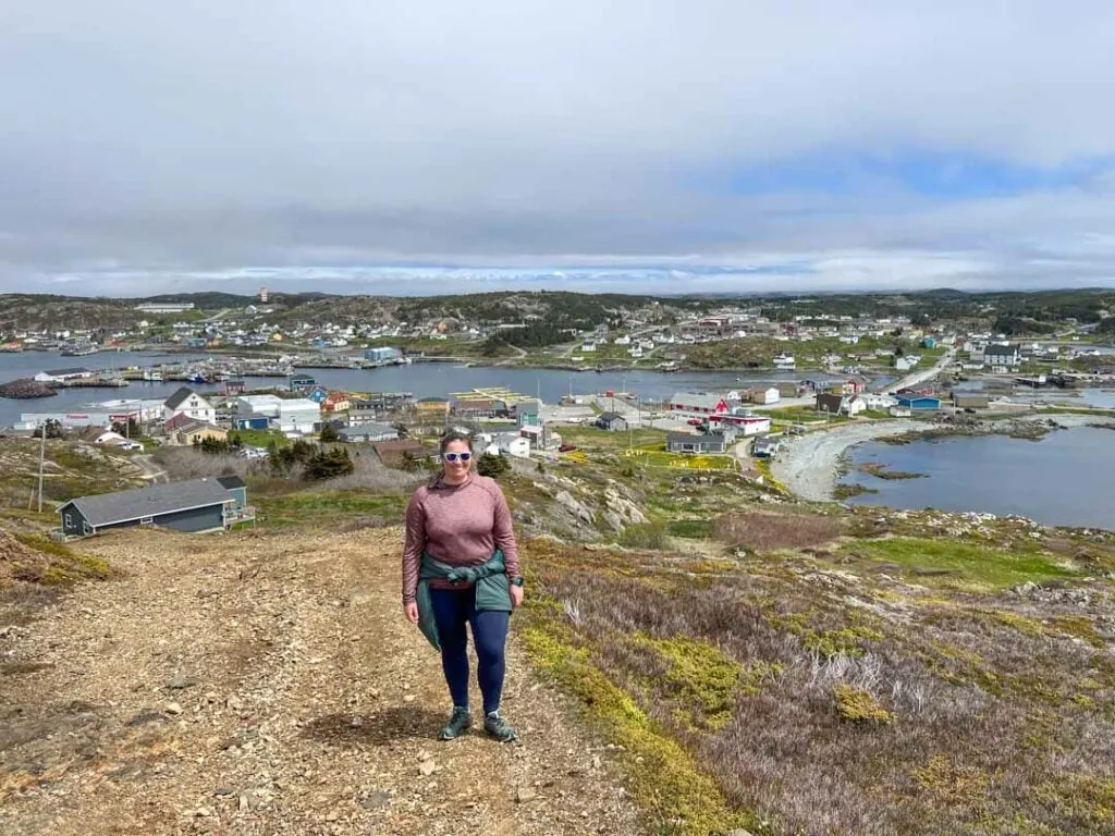 A woman hikes up the trail to Smith's Lookout in Twillingate