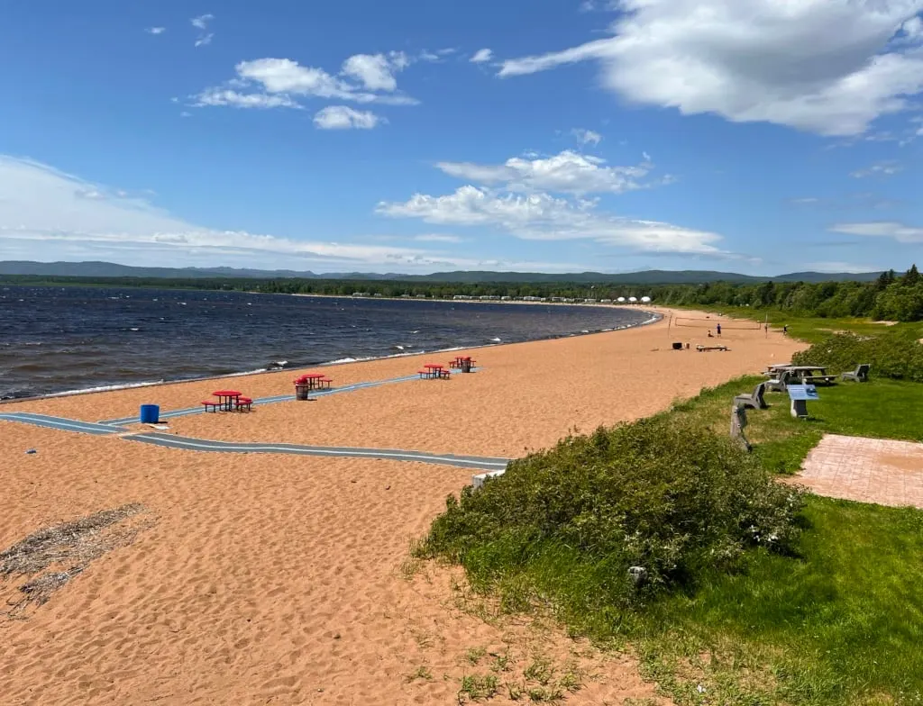 The sandy beach in Deer Lake.