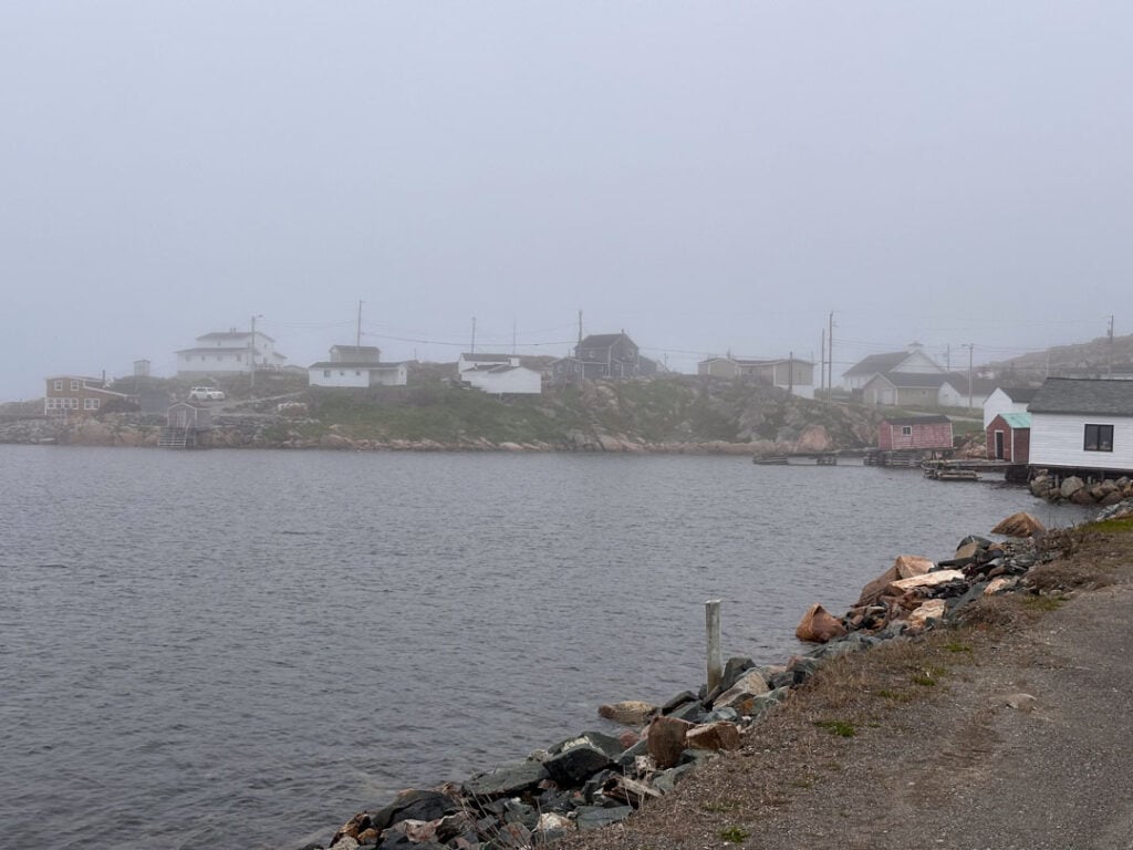 Houses in the fog in Deep Bay on Fogo Island