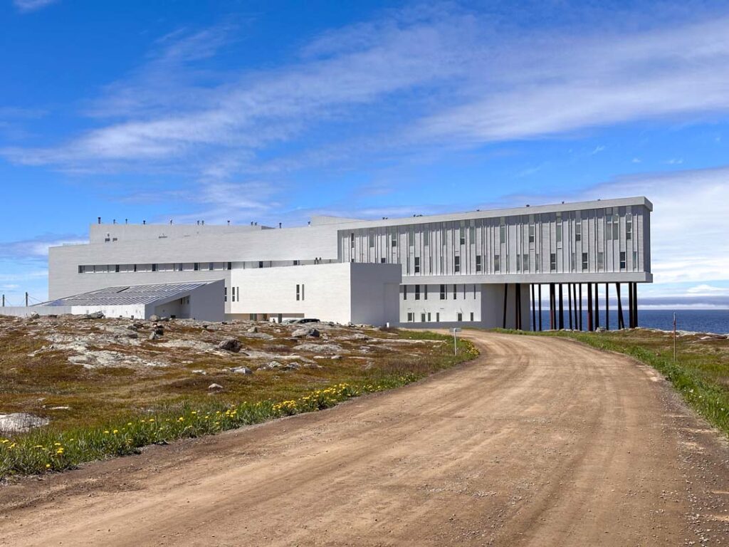 The exterior of the Fogo Island Inn seen from the driveway