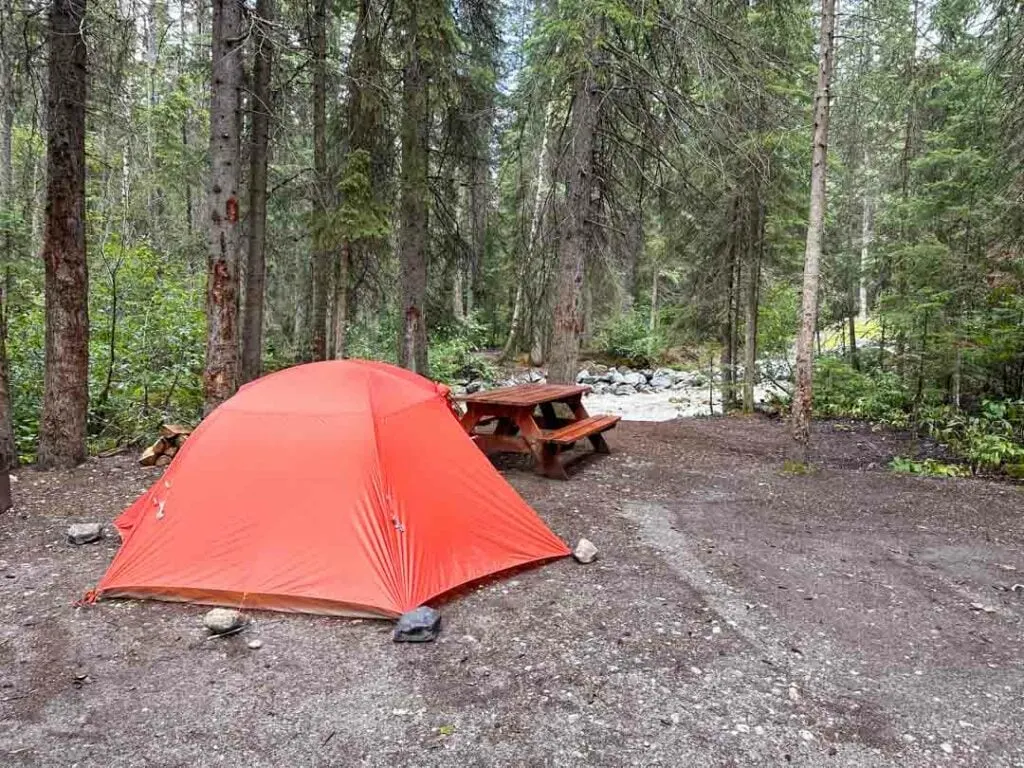 An orange tent at Kicking Horse Campground