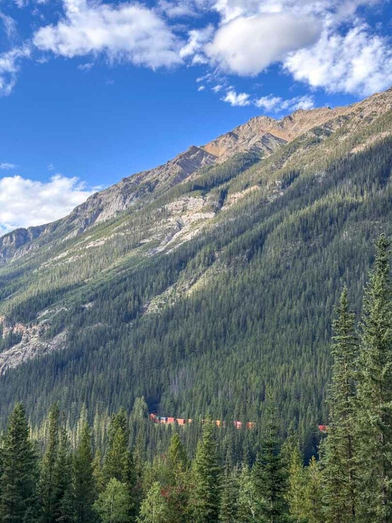 A train goes through the spiral tunnels in Yoho National Park