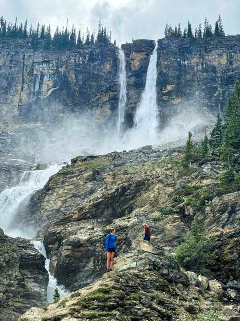 Hikers explore the base of Twin Falls