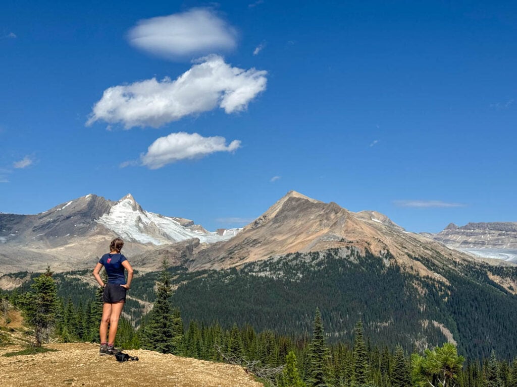 A hiker at the Whaleback Viewpoint in the Yoho Valley