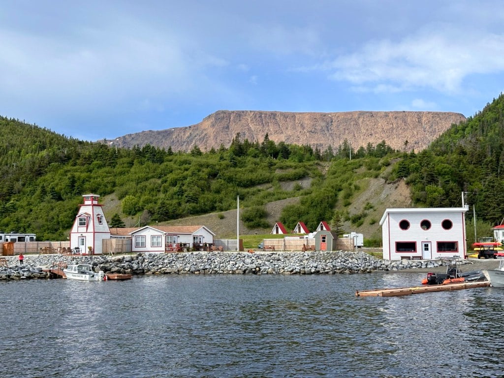 The Wild Gros Morne boat dock with the Tablelands behind it