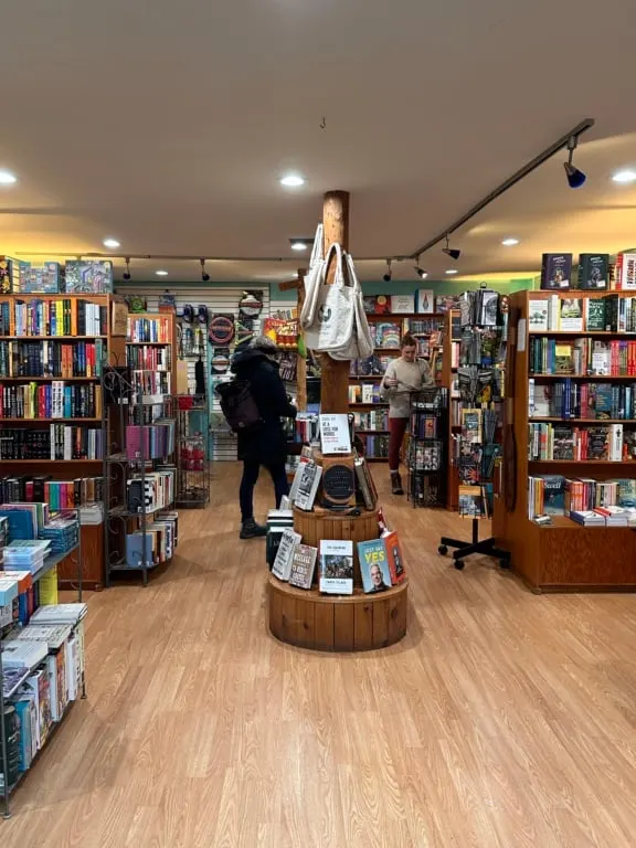 People shop inside Mermaid Tales Book Shop in Tofino