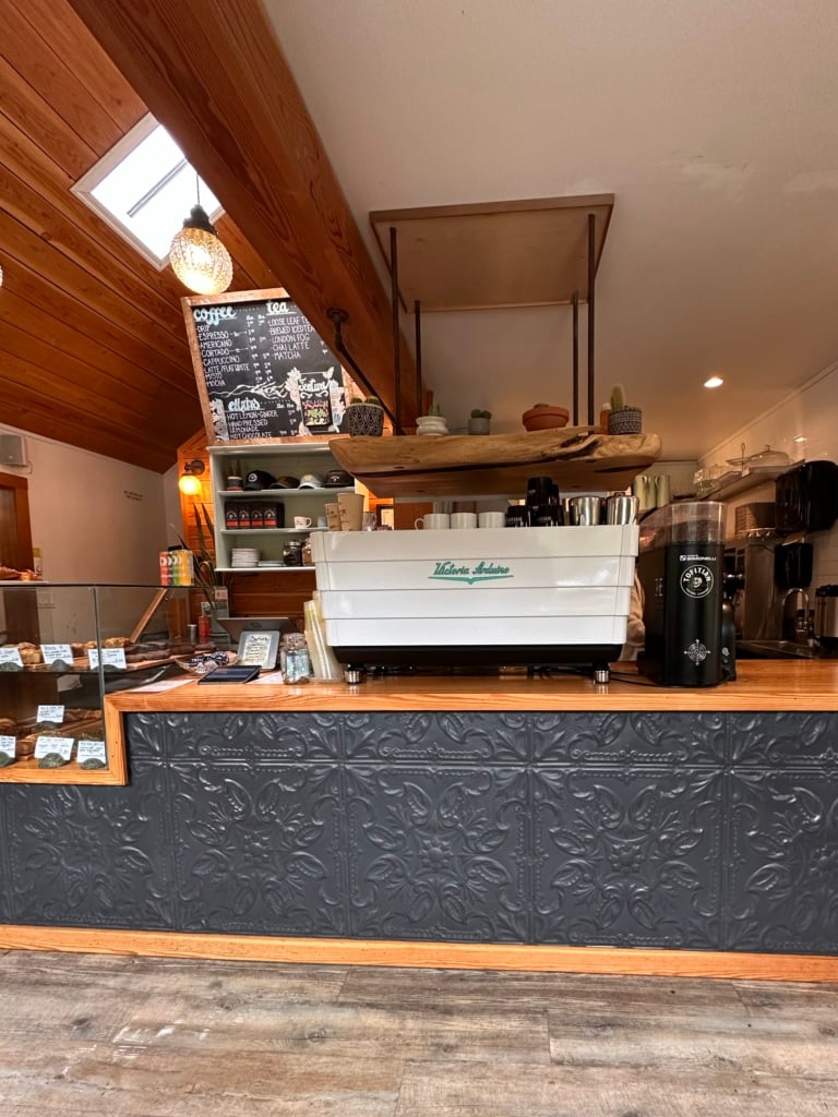 The counter and espresso machine at Tofitian Cofee