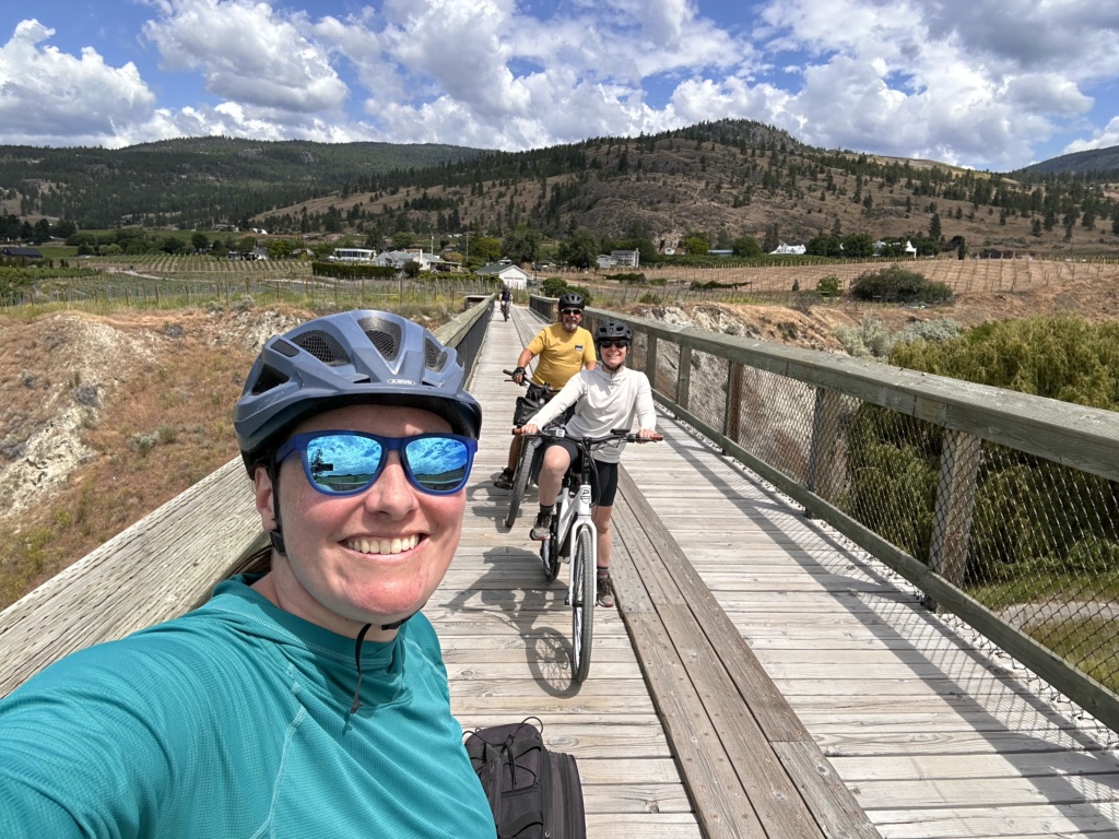 A group of cyclists takes a selfie on the KVR near Penticton