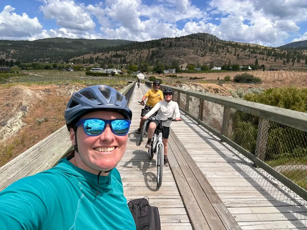 A group of cyclists takes a selfie on the KVR near Penticton