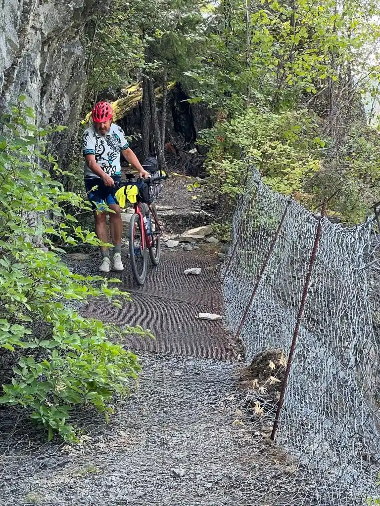 A bikepacker on the Sea to Sky Trail