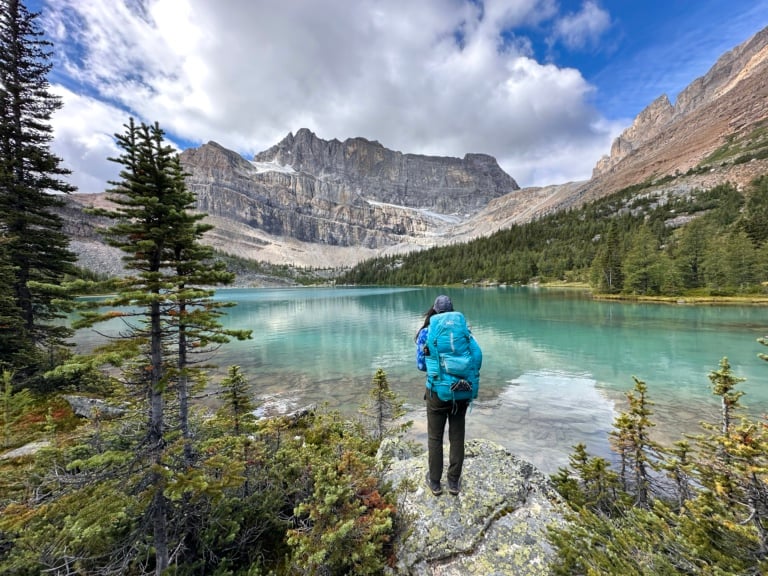 A hiker at Myosotis Lake
