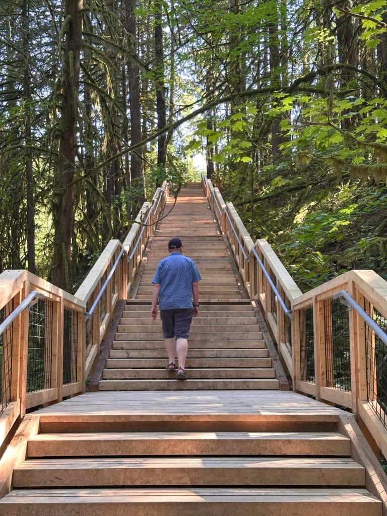 A man on the stairs at Squamish Canyon