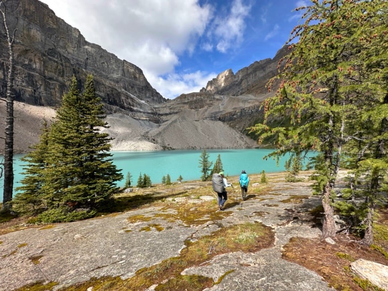 Hikers on the shore of Zigadenus Lake.