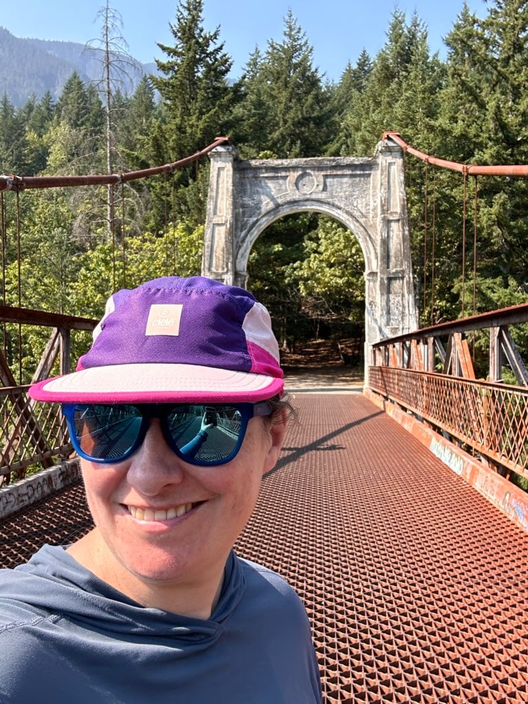 A woman takes a selfie at Alexandra Bridge in the Fraser Canyon