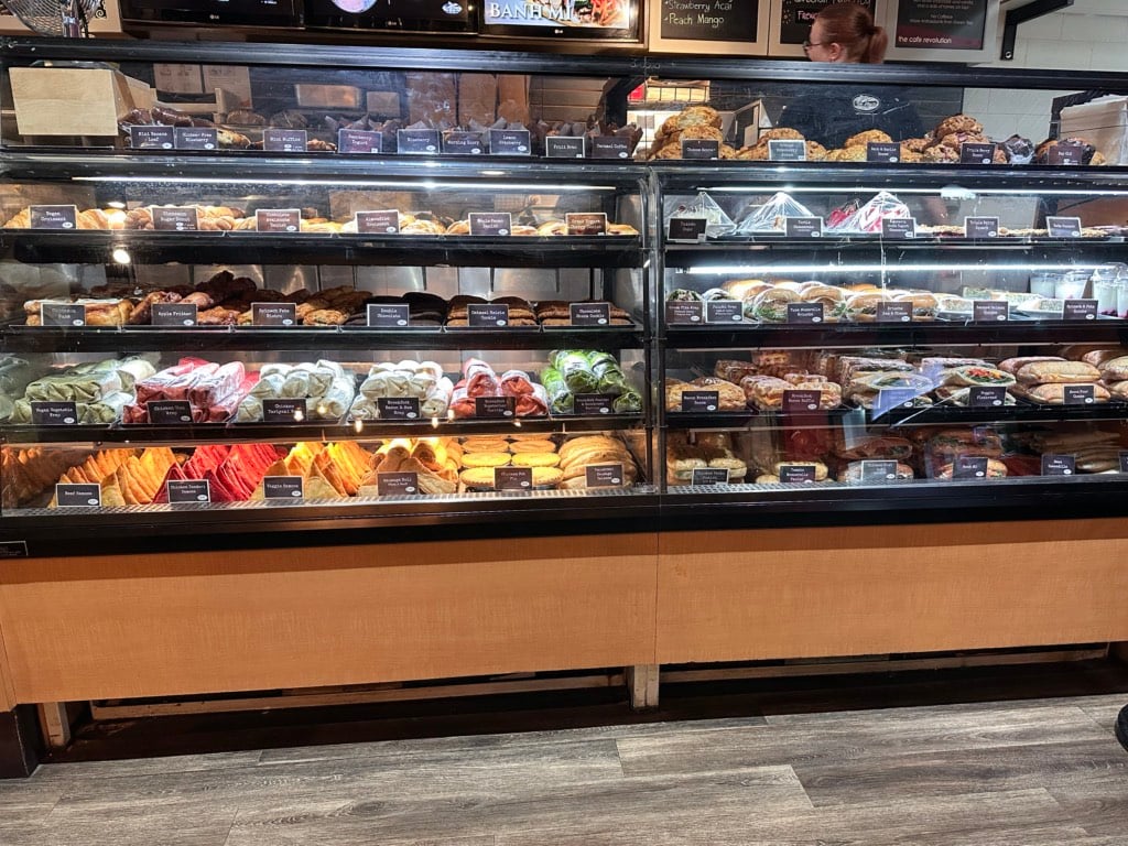 A glass case full of pastry and sandwiches at Blue Moose in Hope