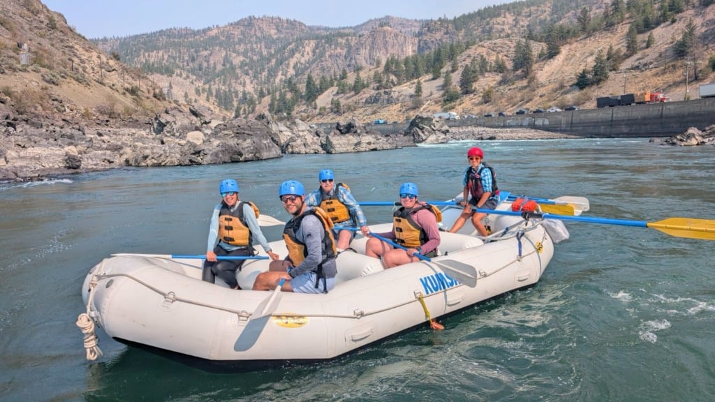 A group whitewater rafting with Kumsheen Rafting on the Thompson River