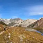 Two hikers walking along the trail to Russet Lake near Whistler