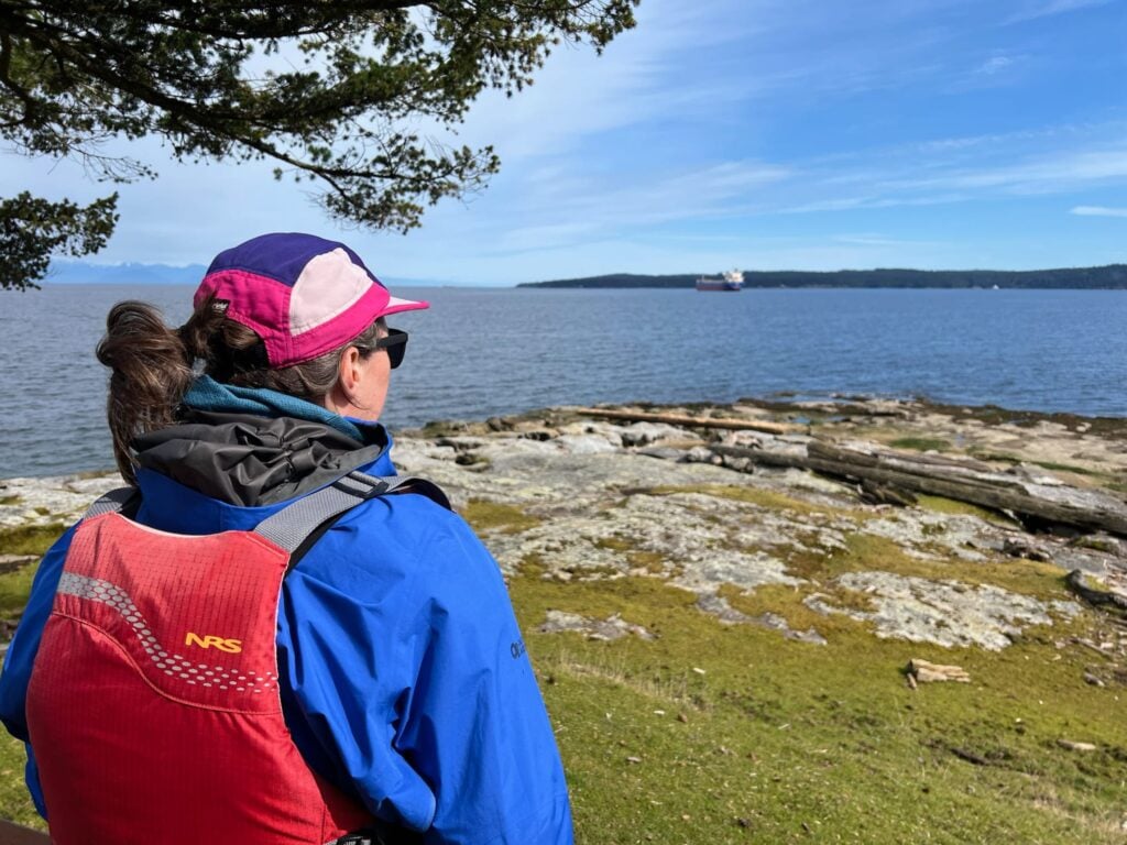 A woman looks at the view on Saysutshun in Nanaimo