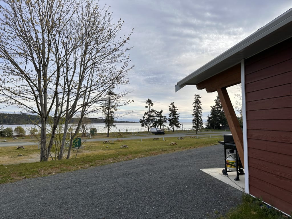 The view of the ocean from a cabin at Snaw Naw As campground