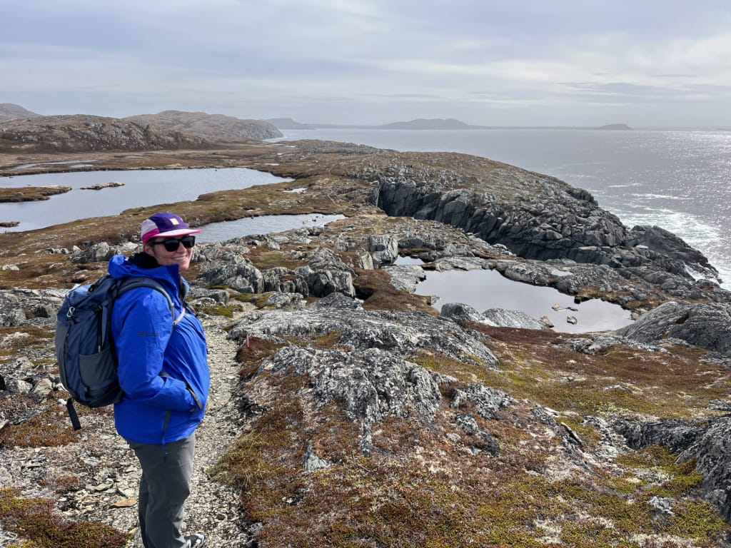A woman hiking on Quirpon Island, NL