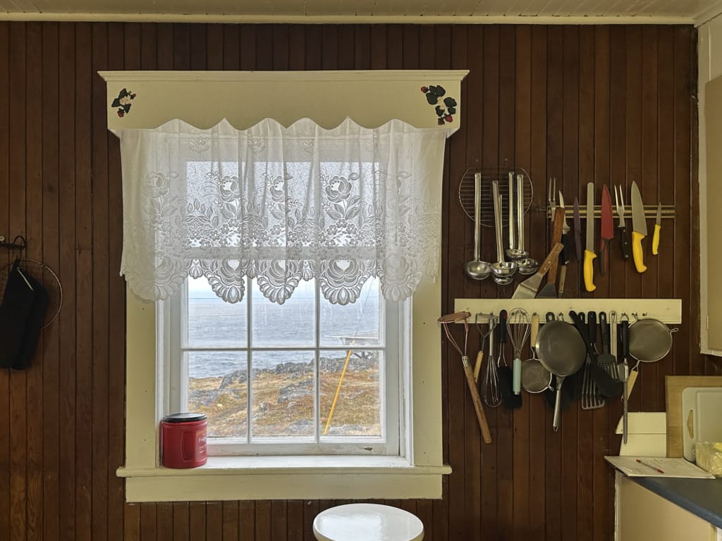 Kitchen utensils on the wall at the Quirpon Lighthouse Inn