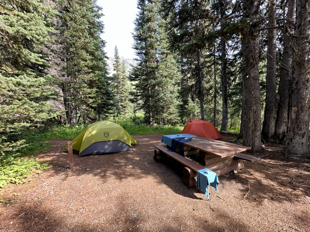 Two tents and a picnic table at the Tenquille Lake Campground