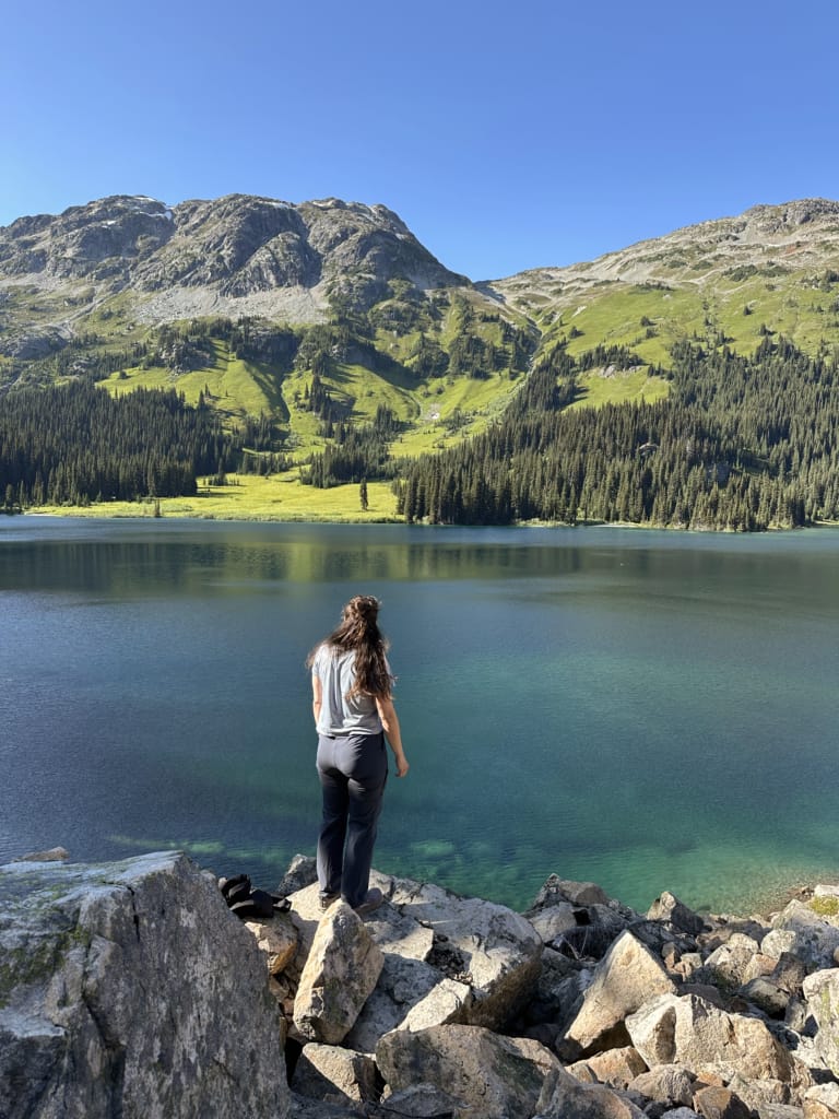 A hiker looks across Tenquille Lake from the Tenquille Lake Loop Trail