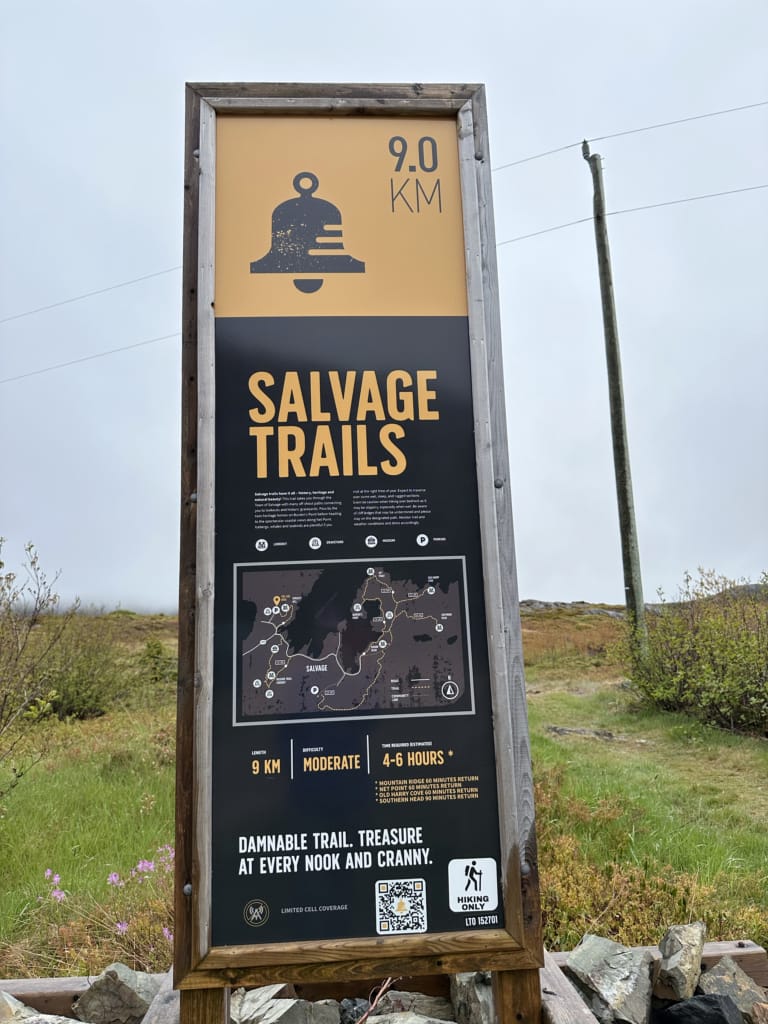 A trail sign with info for the Salvage Trails, part of the Damnable Trail on the Eastport Peninsula