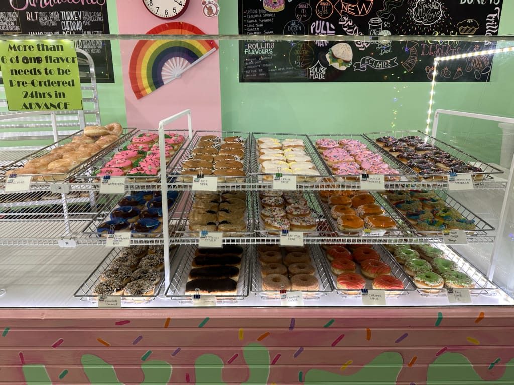 Trays of brightly coloured donuts at Day Dream Donuts in Prince George